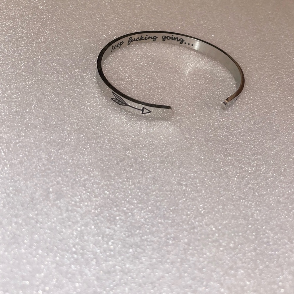 “Keep F***ing going” engraved bangle bracelet